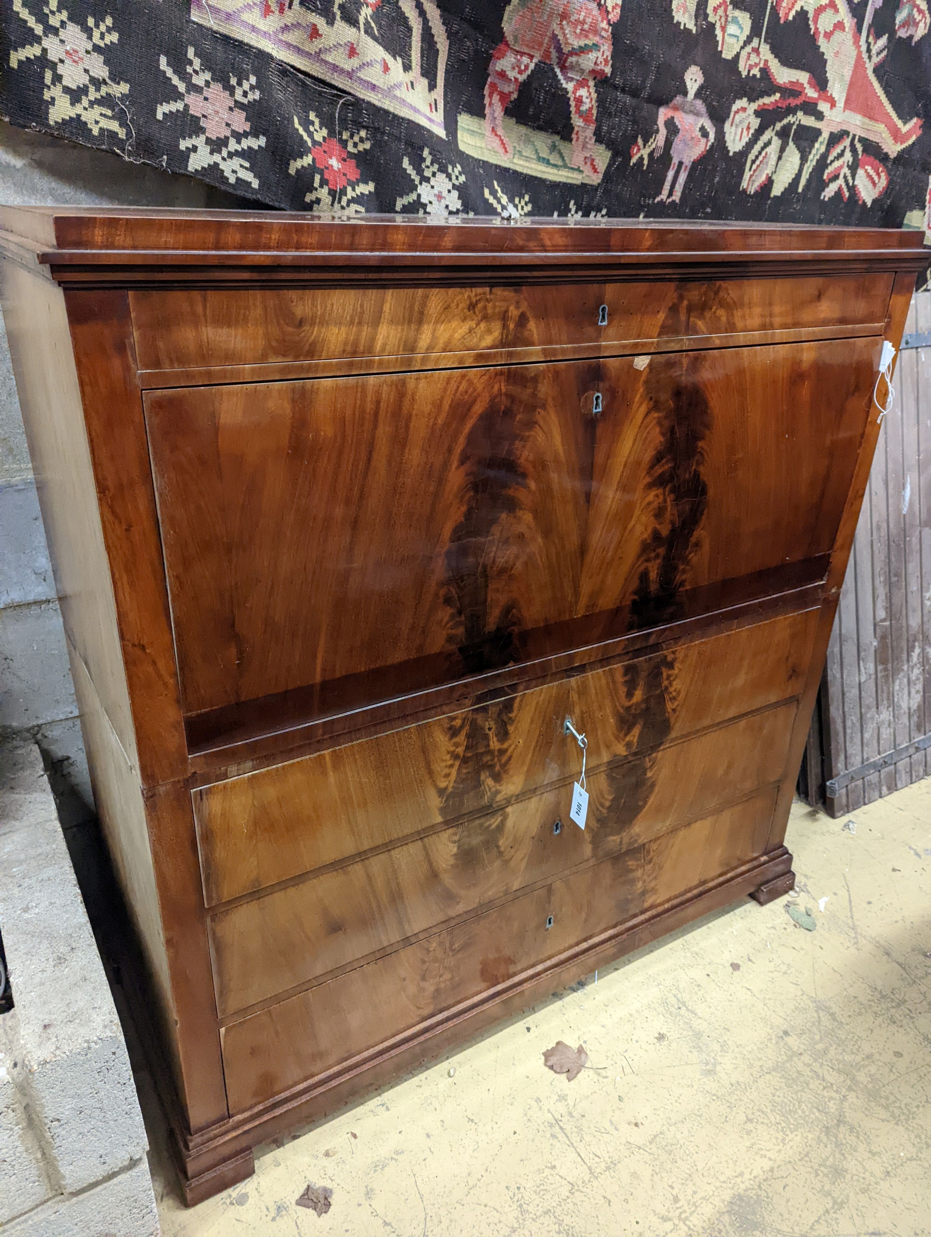An early 19th century Danish flame mahogany secretaire a abbatant, with birchwood fitted interior, length 127cm, depth 56cm, height 130cm